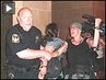 Reporter_arrested_button