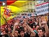 Spain_protest_button