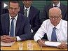 Murdoch_hearing_button