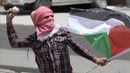 Stone-throwing_youth-2