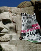 Greenpeace Activists Hang Banner on Mt. Rushmore