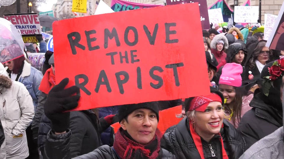 H11 protestors turn out womens march nationwide national archvies under fire doctoring photo 2017 march