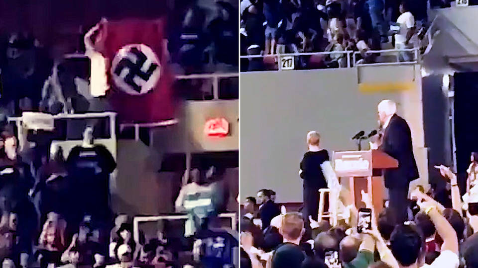 H6 bernie sanders campaign rally disrupted by protestor with nazi flag