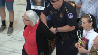 H1 catholics arrested capitol hill protest immigration nuns clergy sit in russell senate office asylum seekers trump policies