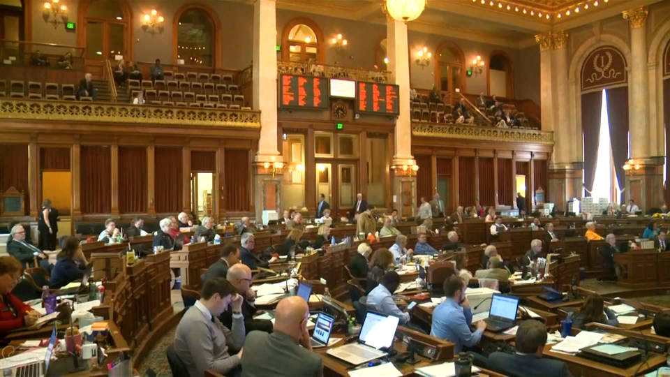 Iowa governor signs 'heartbeat' bill banning most abortions
