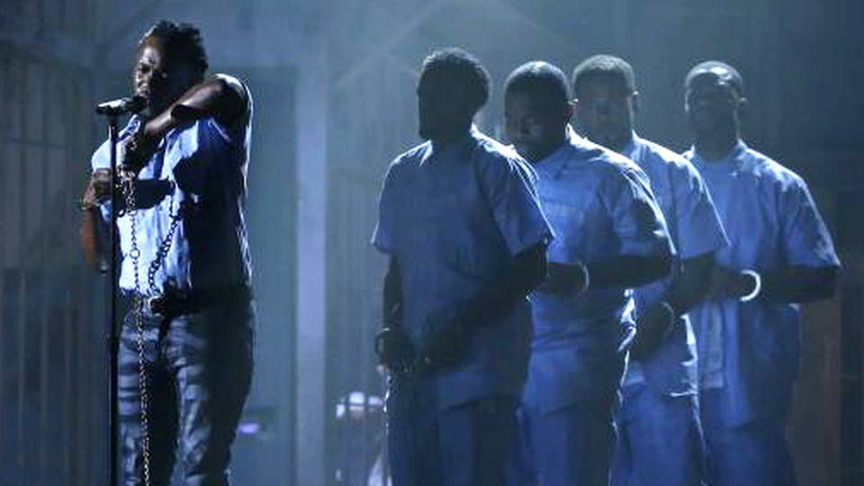 Kendrick Lamar Performs in Prison Garb and Chains, Wins 5 Grammys