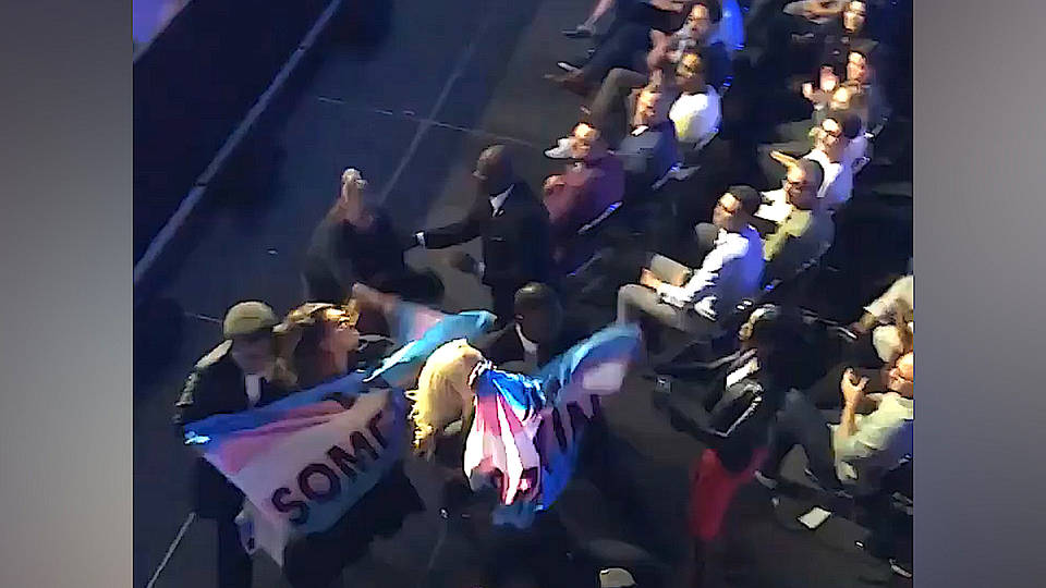 H4 trans lives matter activists cnn democratic town hall protest lgbt rights blossom c brown