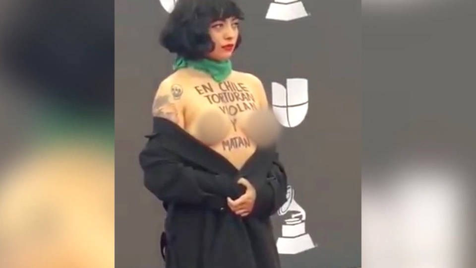 H7 mon laferte topless protest latin grammys las vegas chile violence