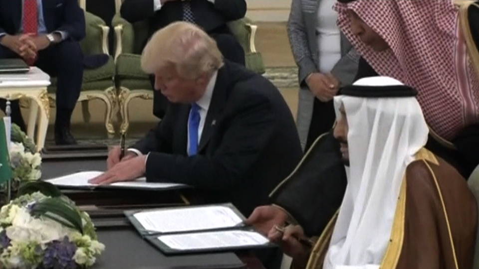 H02 trump saudi sign