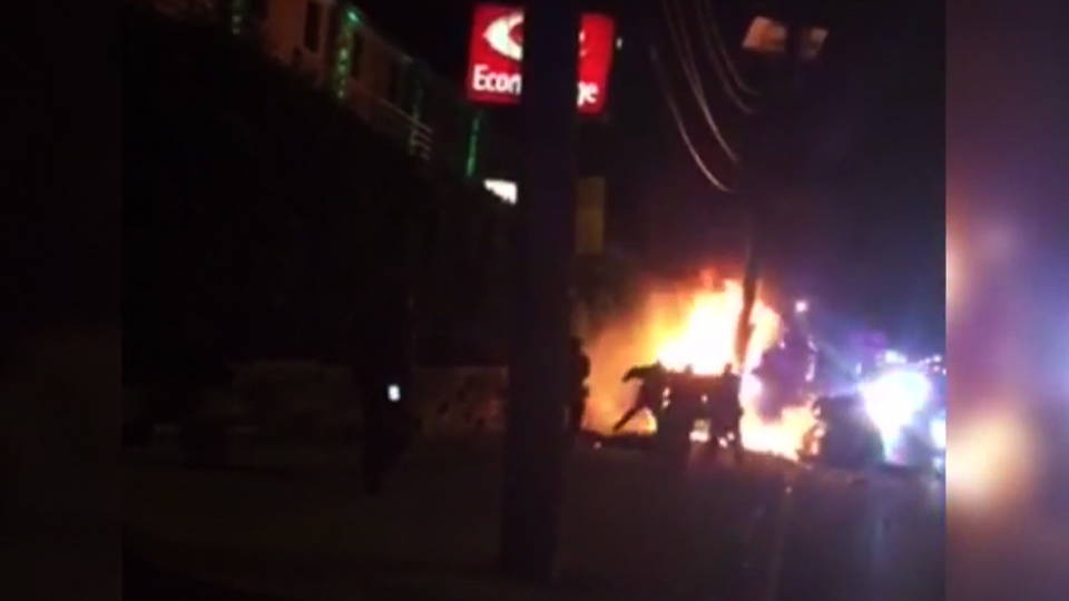 H11 police attack burning man