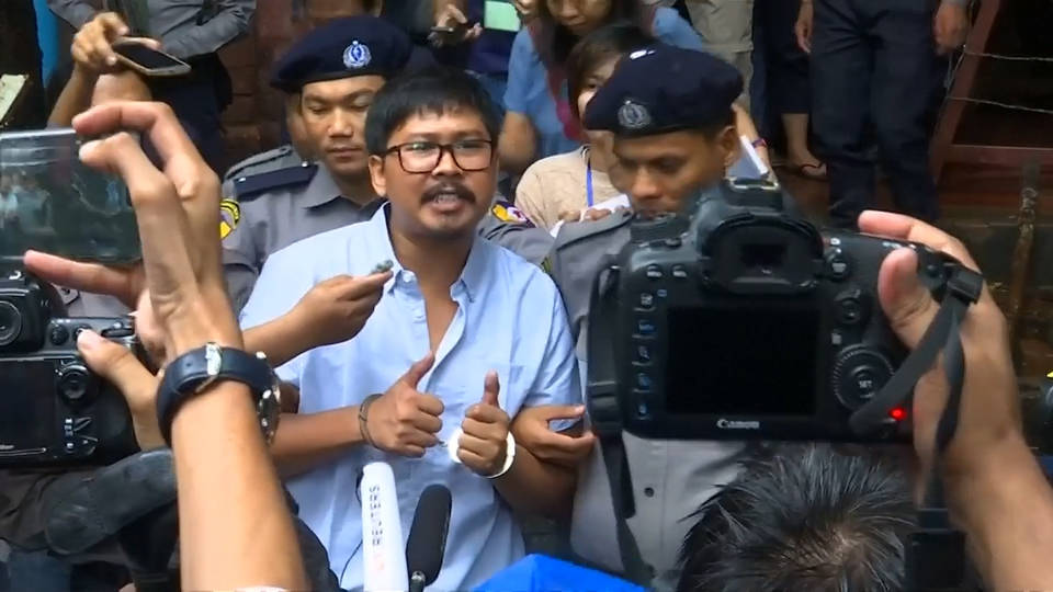 H7 burma reuters staff trial