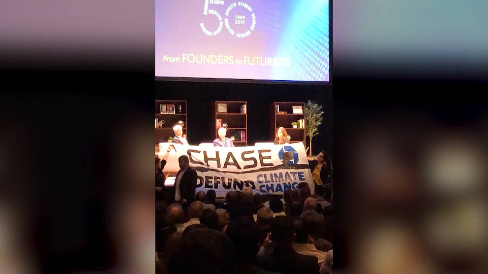 H3 jpmorgan chase fossil fuels protestors confront ceo jamie dimon ucla investments oil gas