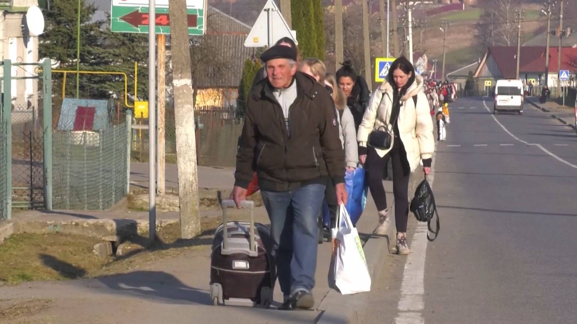 Mariupol Residents Evacuate as Russia Blocks Aid Convoy; Kyiv Declares Curfew