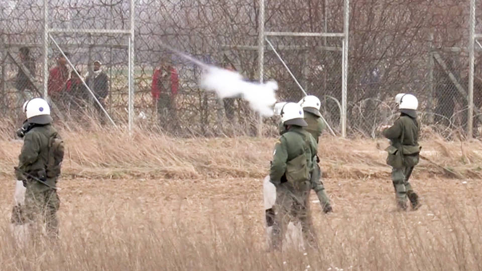 H7 turkey accuses greece killing migrant greek riot police fire tear gas border