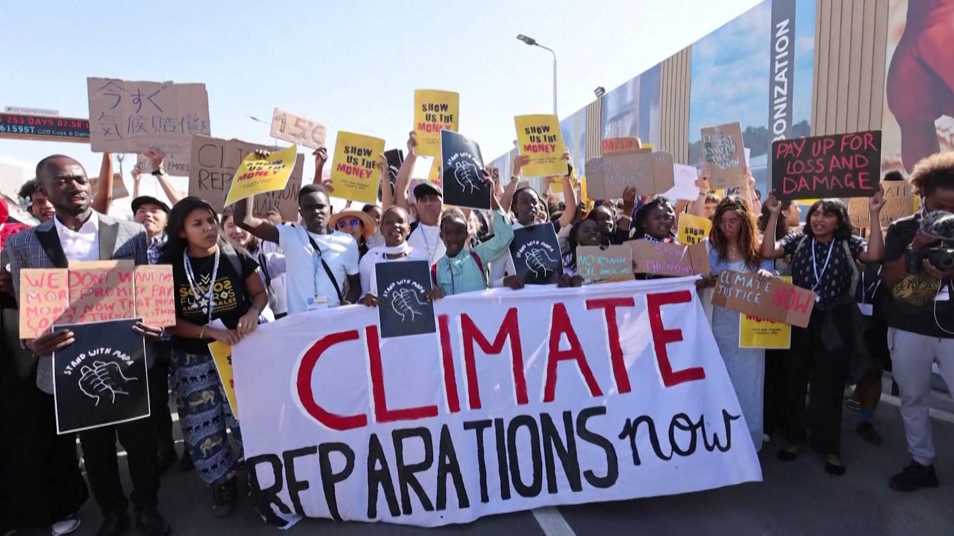 Climate activists protesting for reparations.