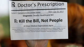 S01_Health_Protest_Sign.jpg