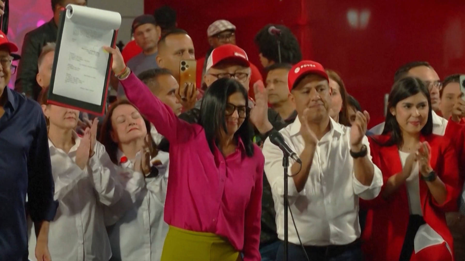 “Hostile Takeovers”: As U.S. Claims Venezuela’s Oil, Trump Seeks “Vassal States” Across the World